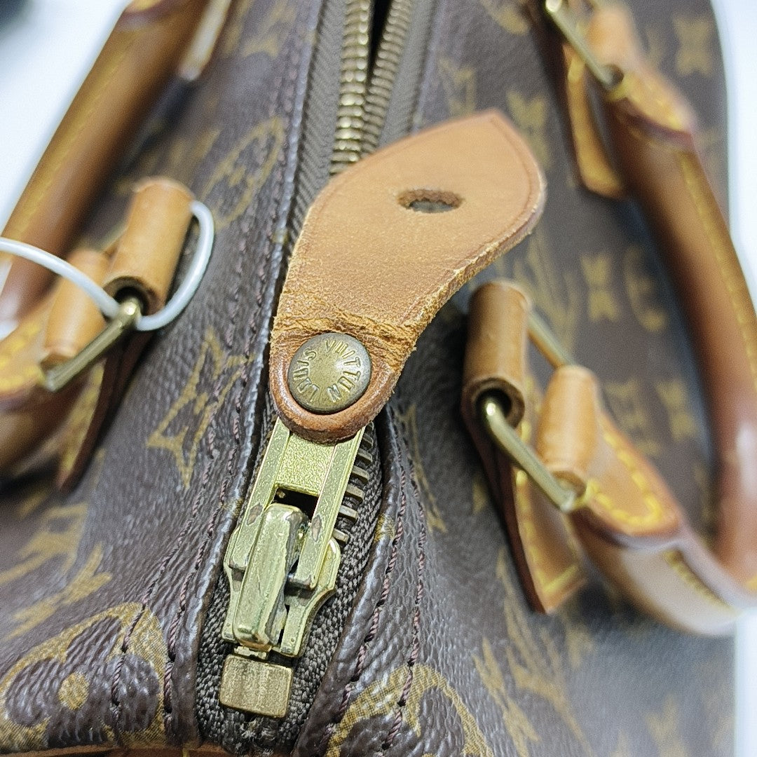 SPEEDY 25 Monogram Coated Canvas Brown