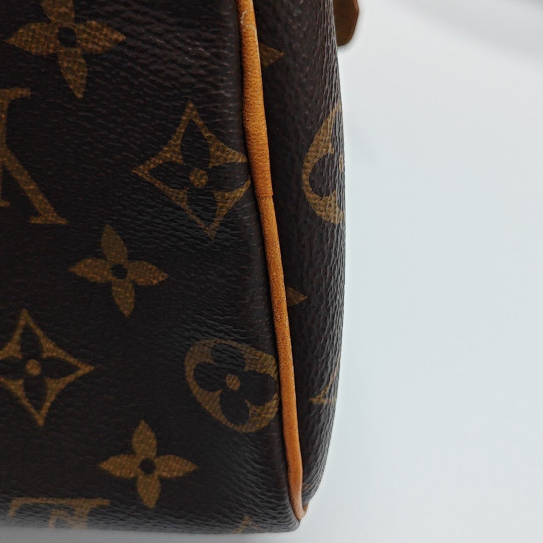 SPEEDY 25 Monogram Coated Canvas Brown