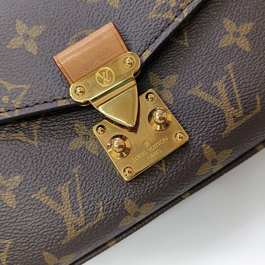 MÉTIS EAST WEST Monogram Coated Canvas Brown