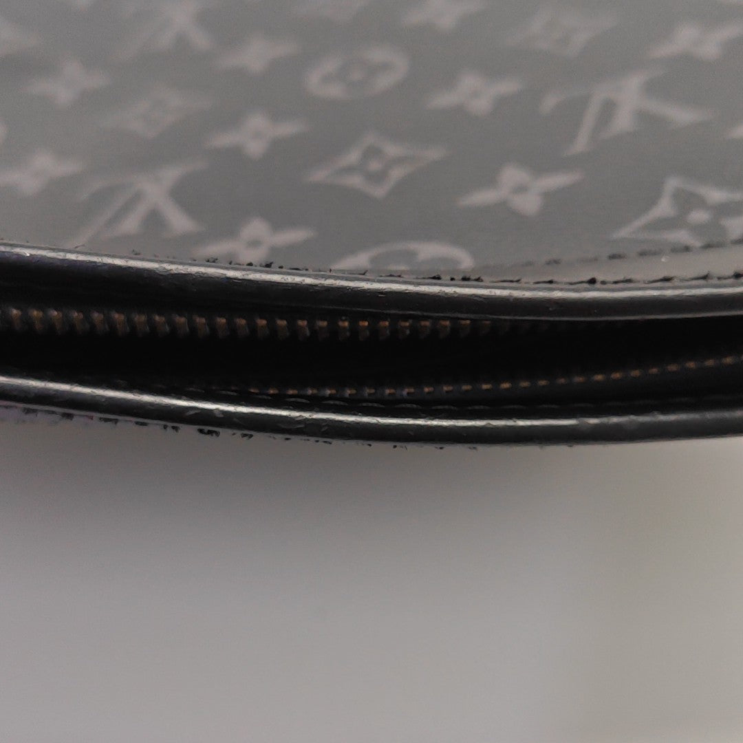 Pochette Voyag MM Monogram Coated Canvas Black
