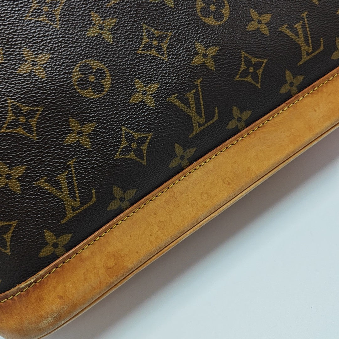 ALMA PM Monogram Coated Canvas Brown