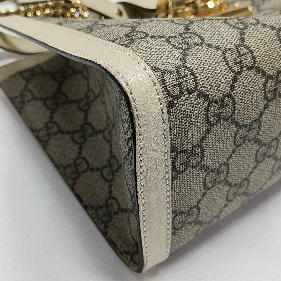 Padlock Small Monogram Coated Canvas Beige