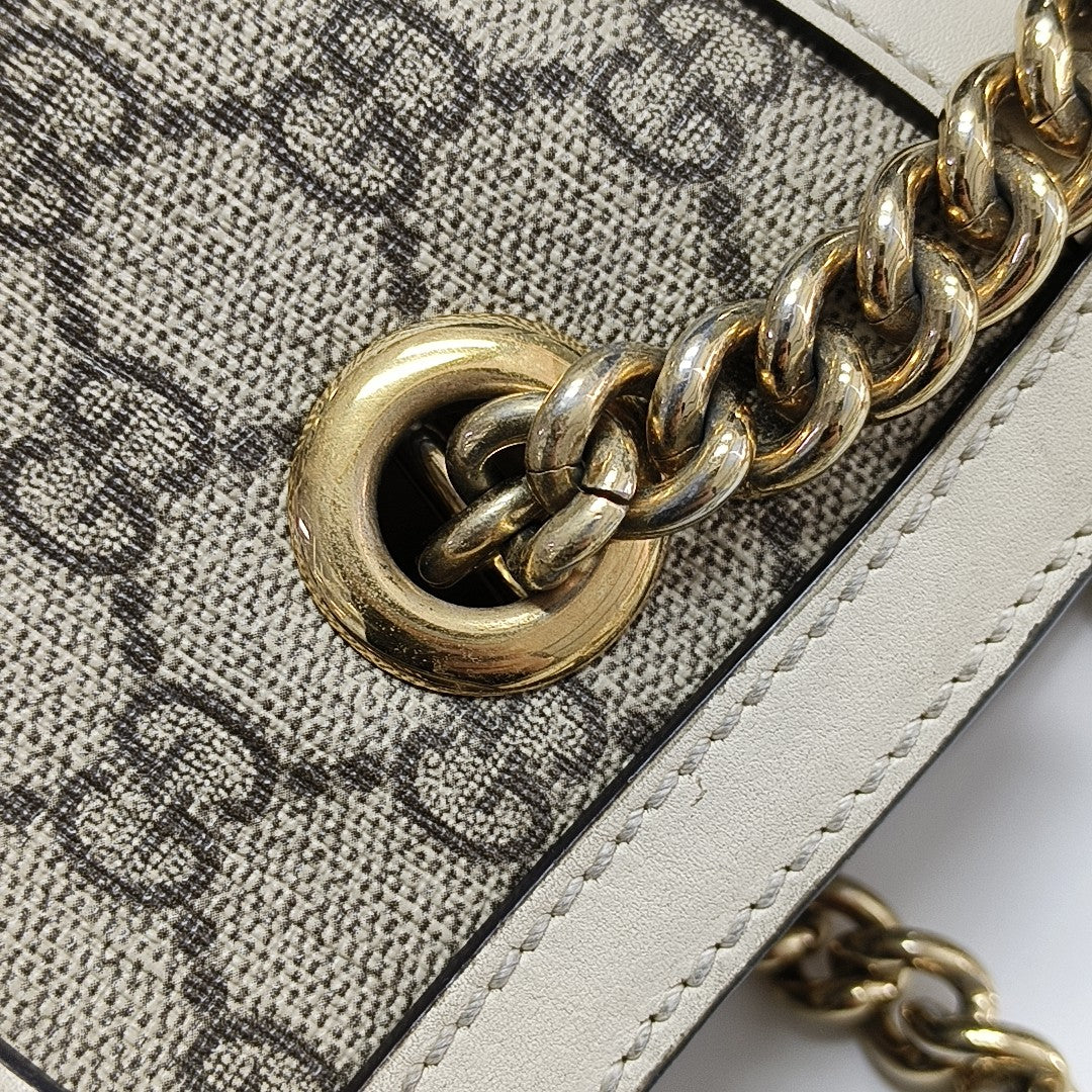 Padlock Small Monogram Coated Canvas Beige