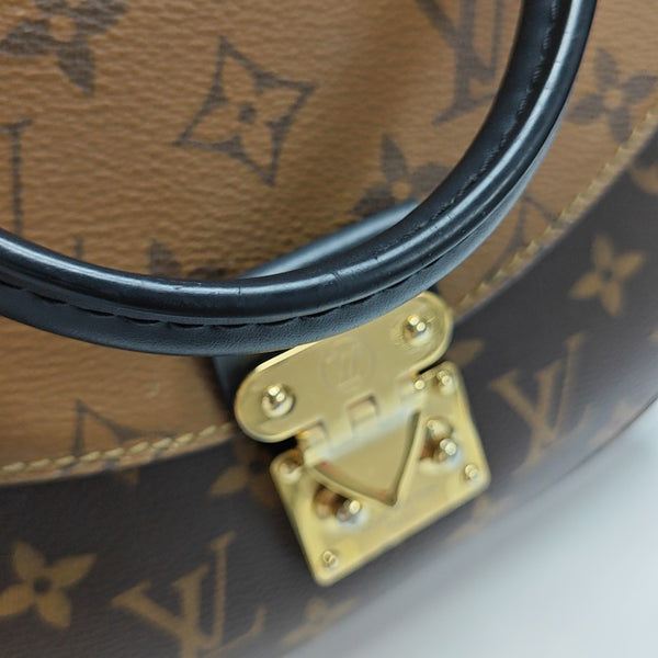 EDEN Monogram Coated Canvas Brown