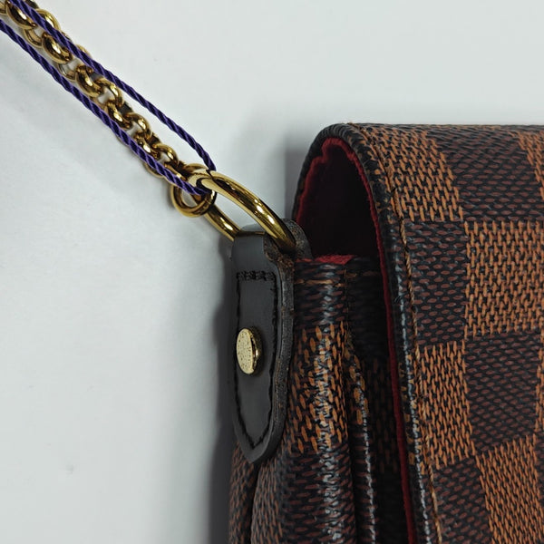 FAVORITE PM Damier Ebene Coated Canvas Brown