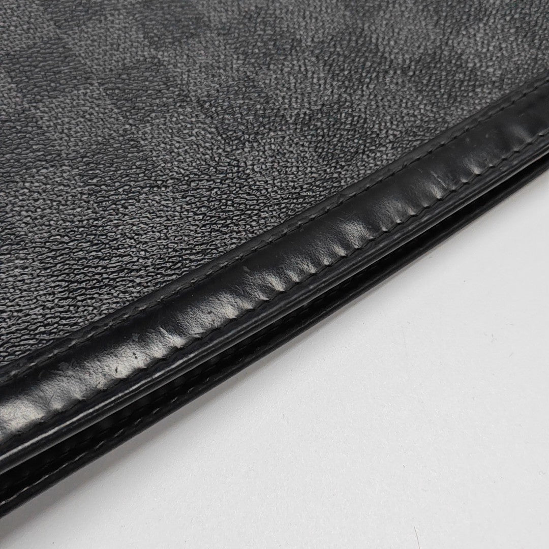 Pochette Voyag MM Monogram Coated Canvas Black