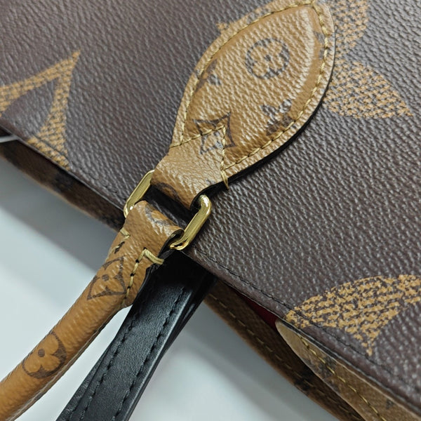 ONTHEGO MM Monogram Coated Canvas Brown