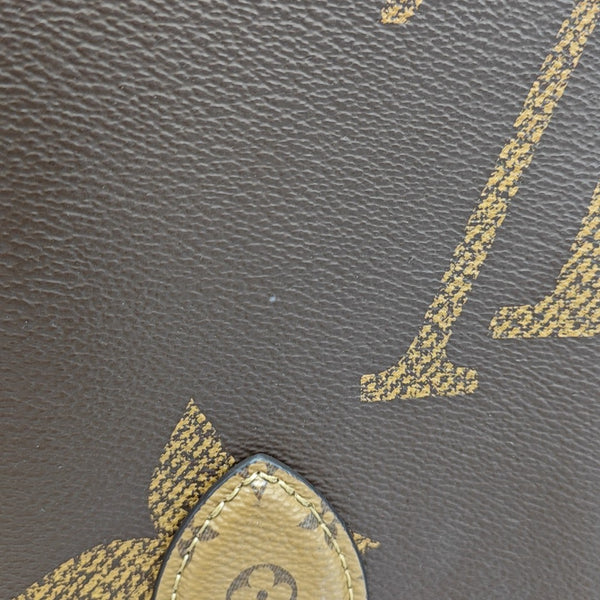 ONTHEGO MM Monogram Coated Canvas Brown