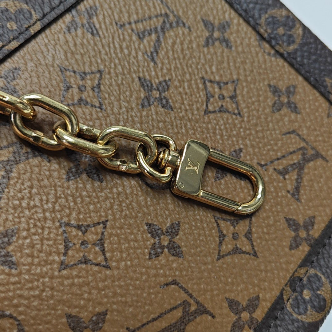 TRUNK Monogram Coated Canvas Brown