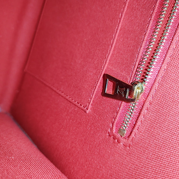 ONTHEGO MM Monogram Coated Canvas Brown