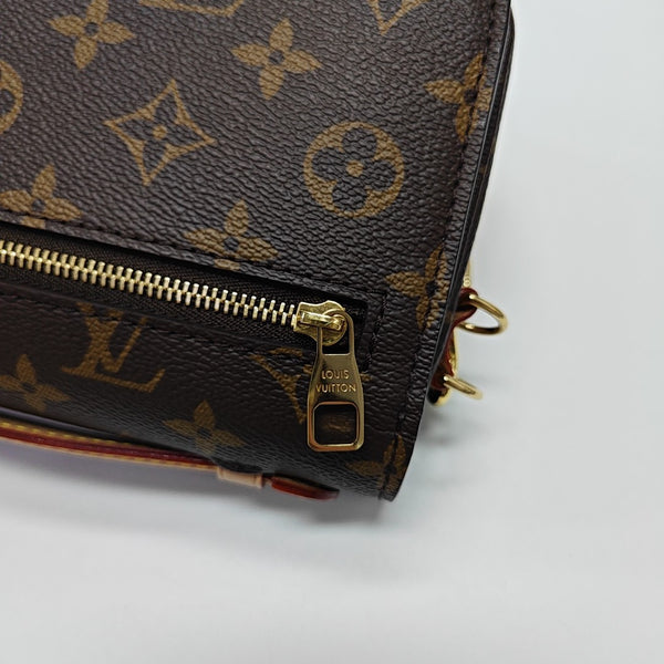 MÉTIS EAST WEST Monogram Coated Canvas Brown
