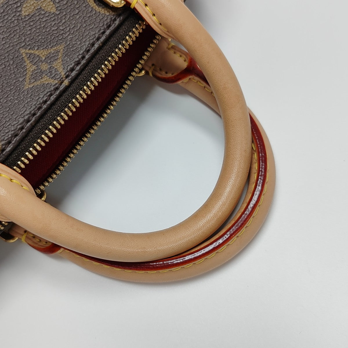 SPEEDY 20 Monogram Coated Canvas Brown