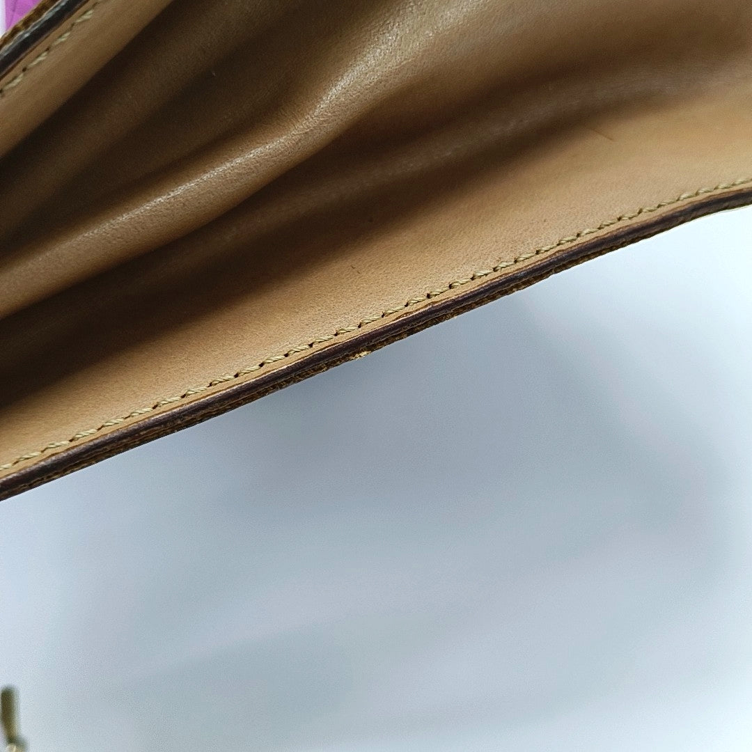 Authenticated pre-owned  MACADAM BLASON TRIOMPHE Coated Canvas Brown - Top Handle Bag at Looply