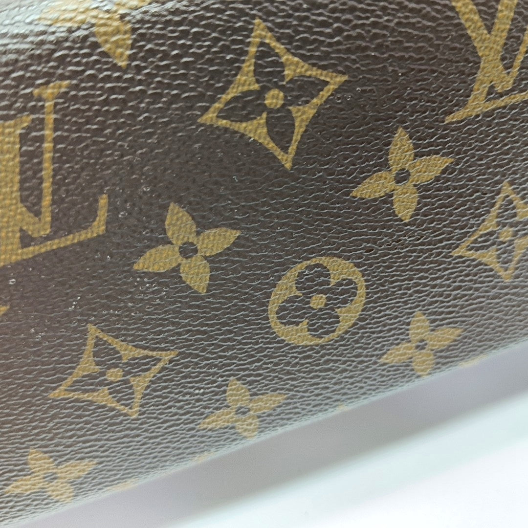 Authenticated pre-owned  PALLAS Monogram Coated Canvas Brown - Clutch at Looply