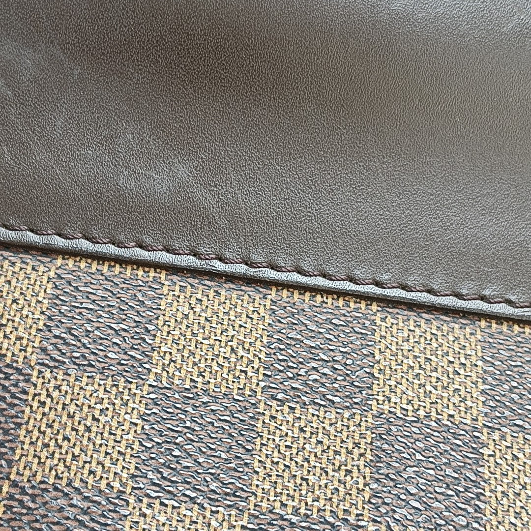WEST END Damier Ebene Coated Canvas Brown