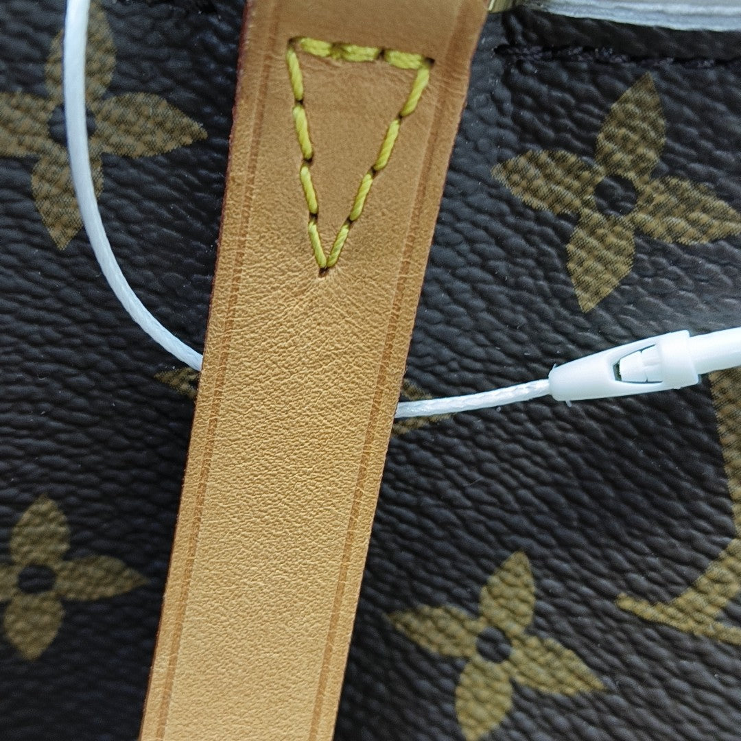 MONTAIGNE MM Monogram Coated Canvas Brown