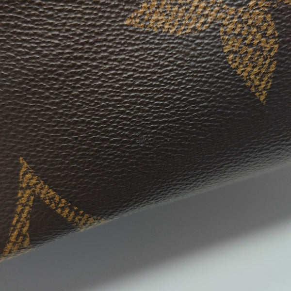 ONTHEGO MM Monogram Coated Canvas Brown