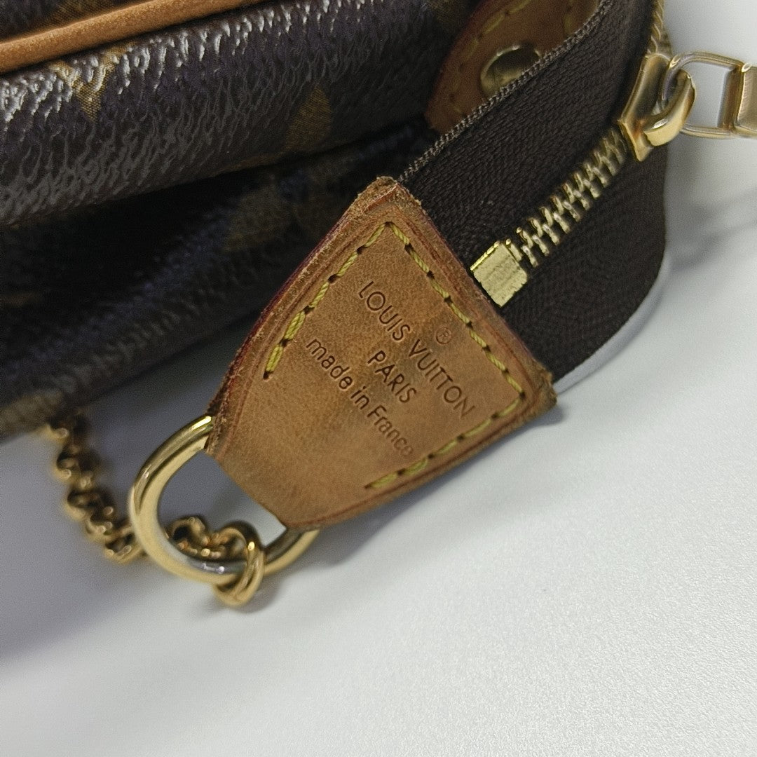 EVA Monogram Coated Canvas Brown