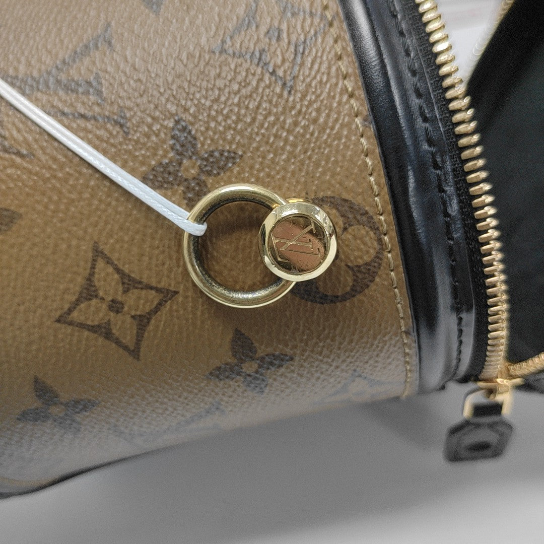CANNES PM Monogram Coated Canvas Brown