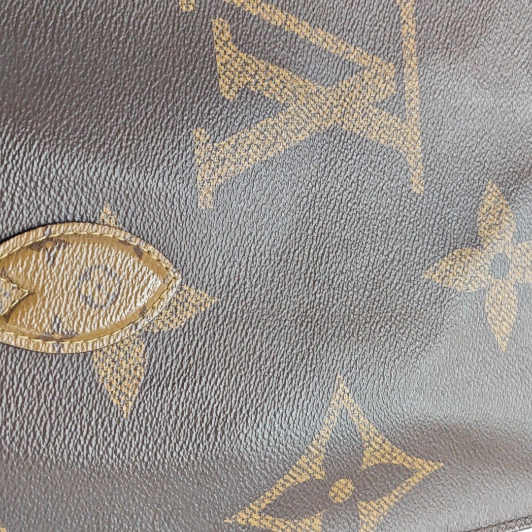 ONTHEGO MM Monogram Coated Canvas Brown