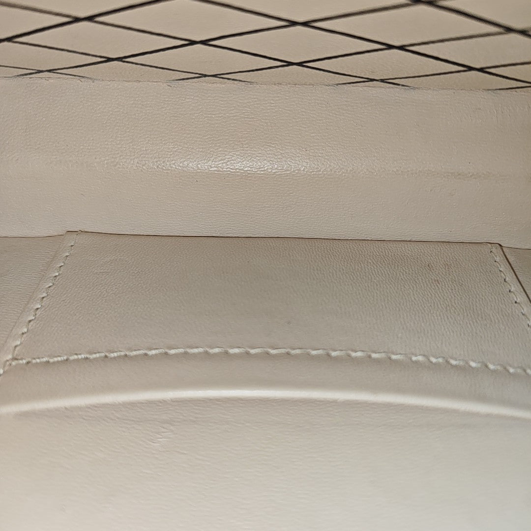 PETITE MALLE Monogram Coated Canvas Brown