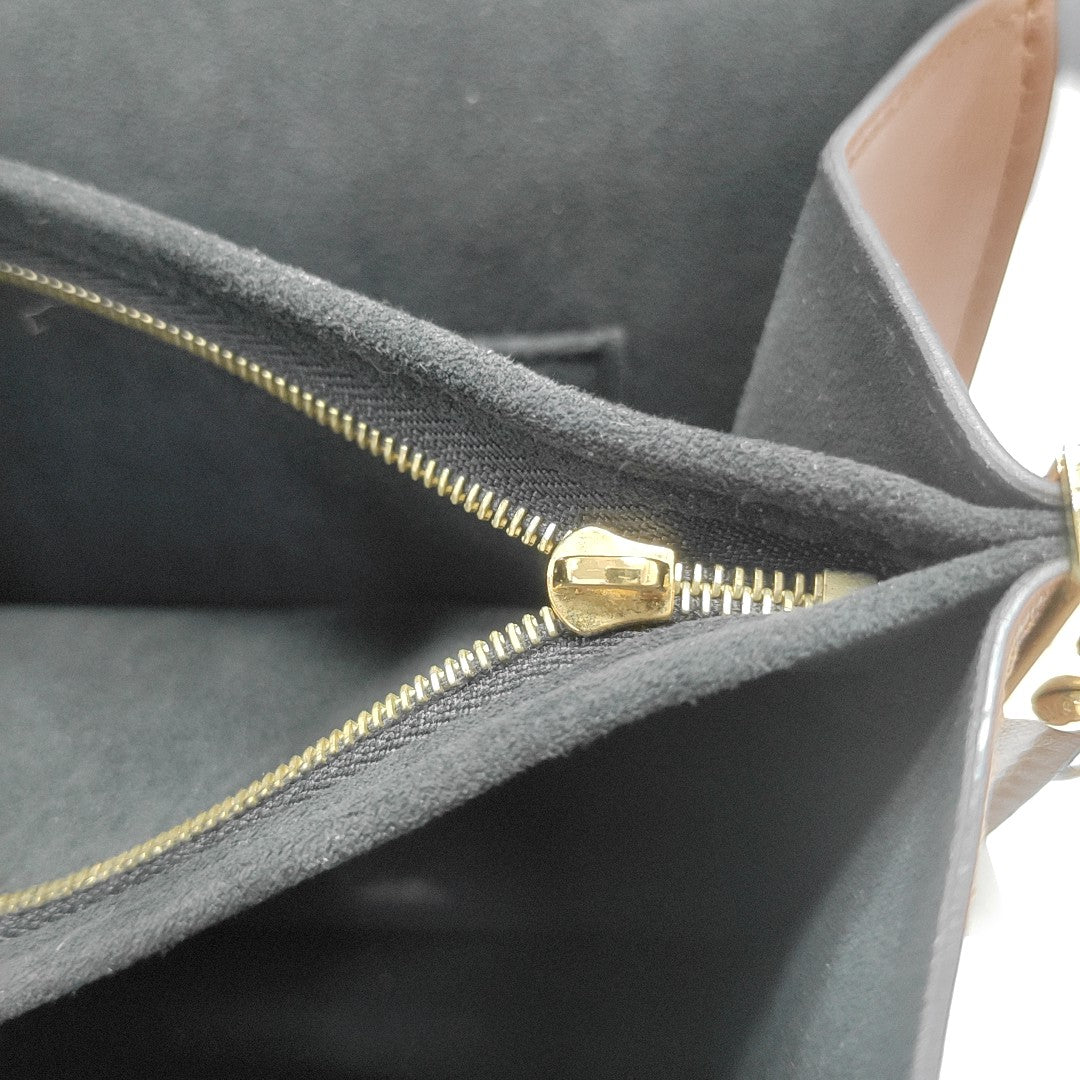 DAUPHINE MM Monogram Coated Canvas Brown