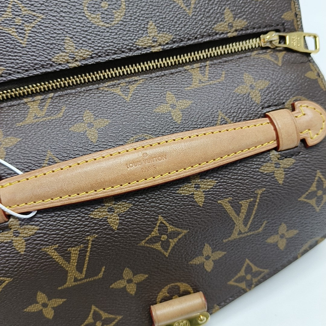 MÉTIS EAST WEST Monogram Coated Canvas Brown