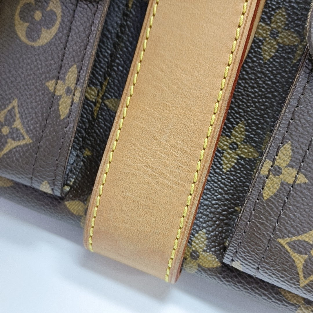 MANHATTAN GM Monogram Coated Canvas Brown