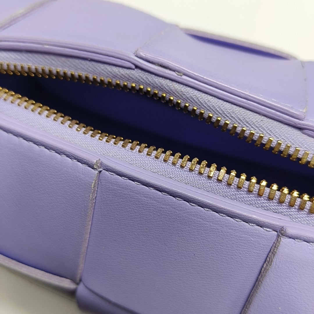 Authenticated pre-owned  Intrecciato Small Lambskin Purple - Top Handle Bag at Looply