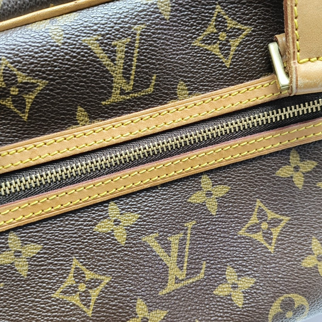 CITE MM Monogram Coated Canvas Brown