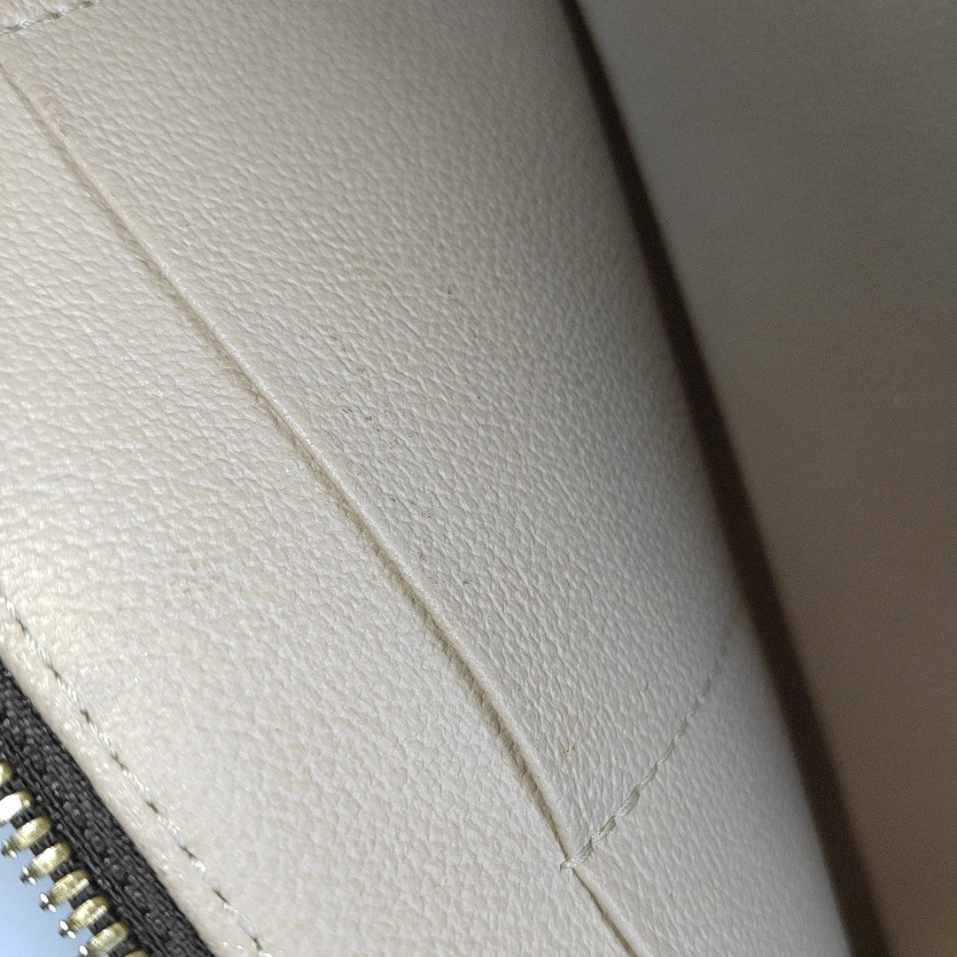 NICE Monogram Coated Canvas Brown