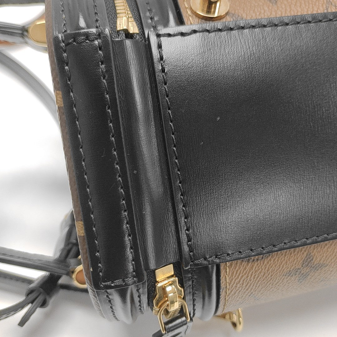 CANNES PM Monogram Coated Canvas Brown
