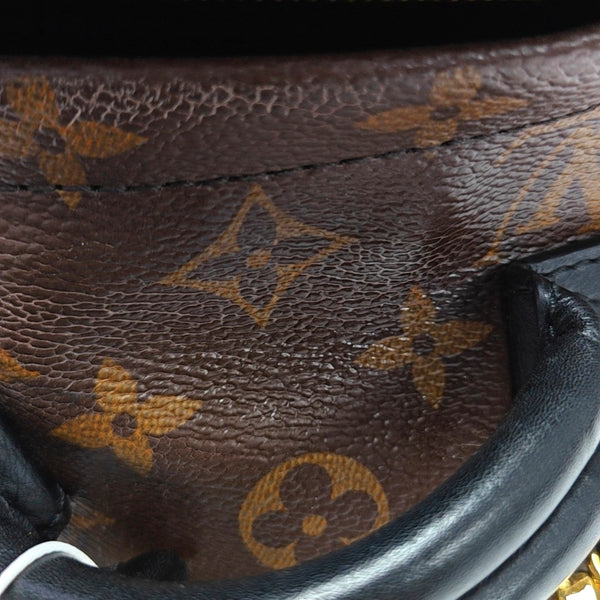Authenticated pre-owned  PALM SPRINGS Mini Monogram Coated Canvas Brown - Backpack at Looply