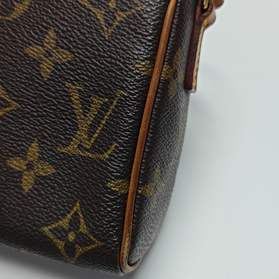 RECITAL Monogram Coated Canvas Brown
