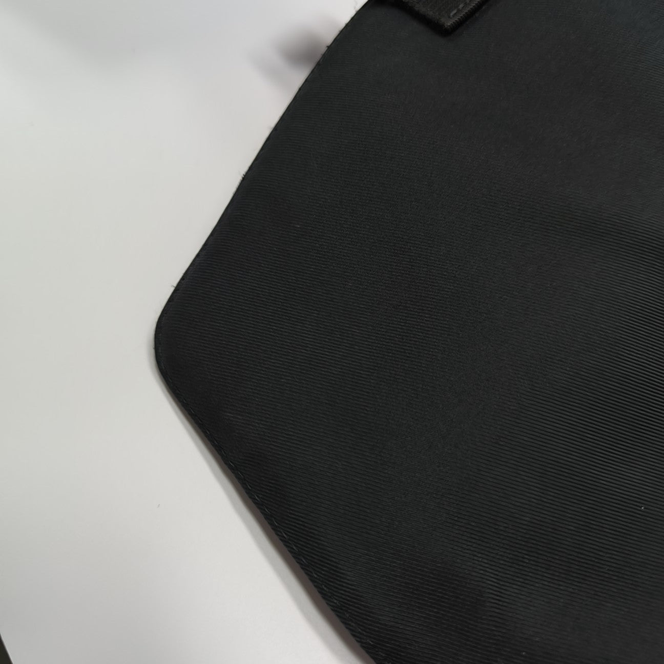 TAIGARAMA Monogram Coated Canvas Black