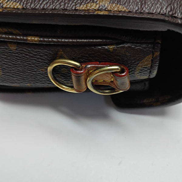 MÉTIS EAST WEST Monogram Coated Canvas Brown