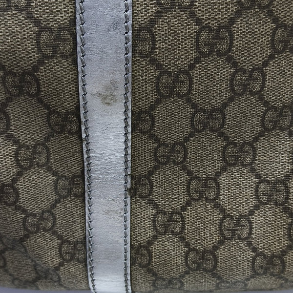 Joy Medium Monogram Coated Canvas Black