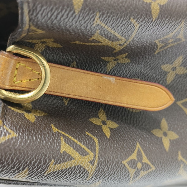 MONTAIGNE GM Monogram Coated Canvas Brown
