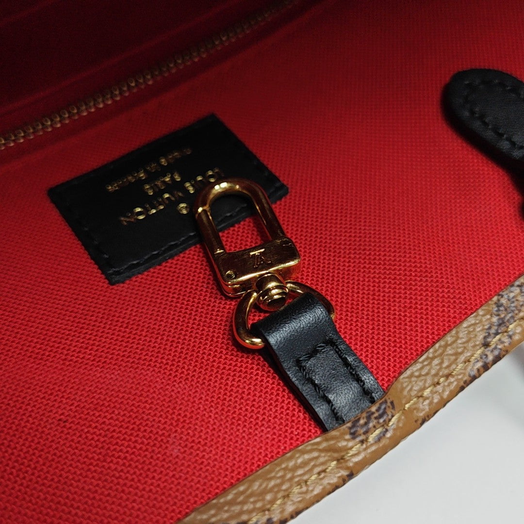 ONTHEGO MM Monogram Coated Canvas Brown