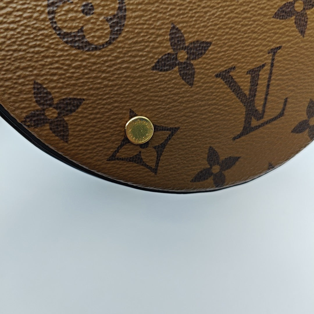CANNES PM Monogram Coated Canvas Brown