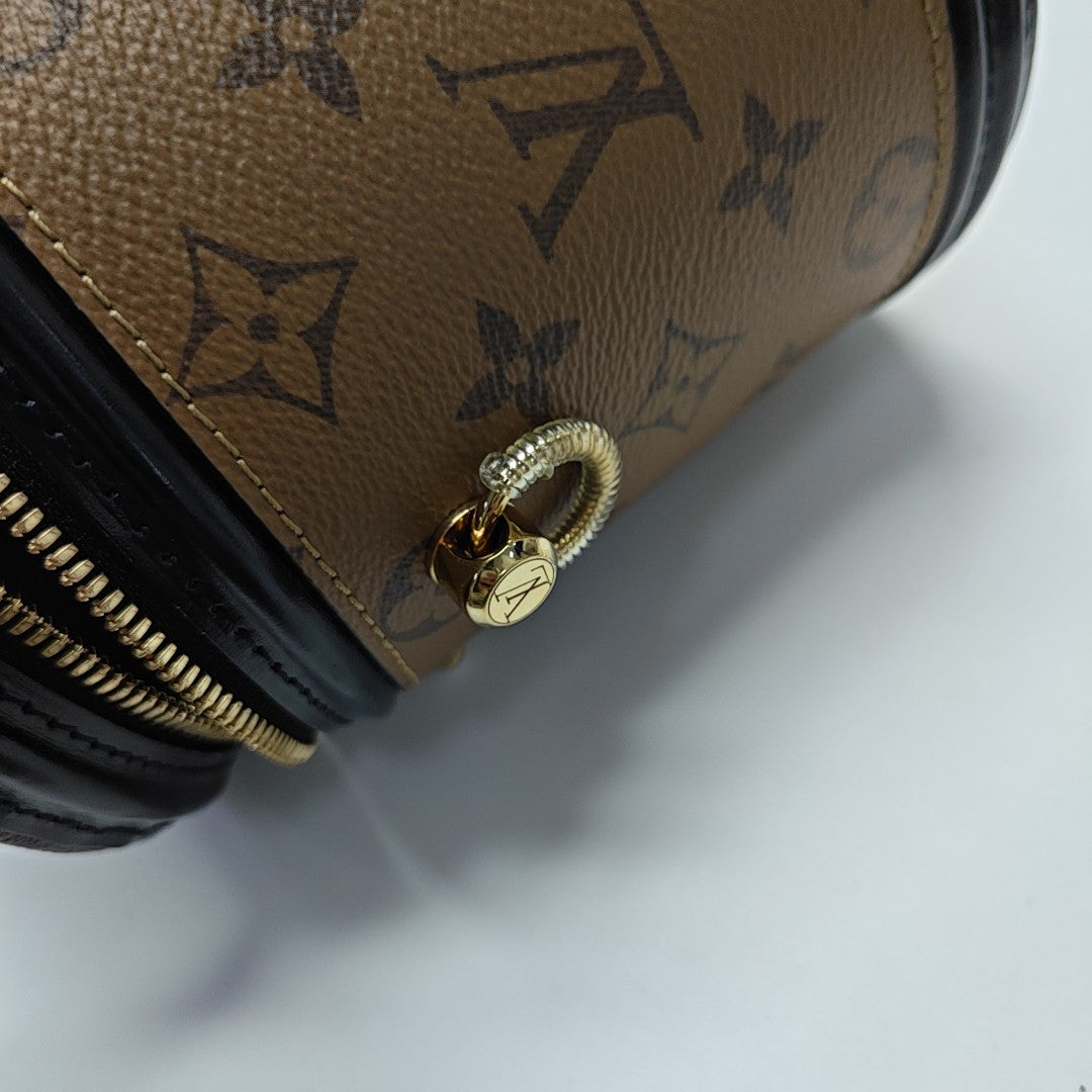CANNES PM Monogram Coated Canvas Brown