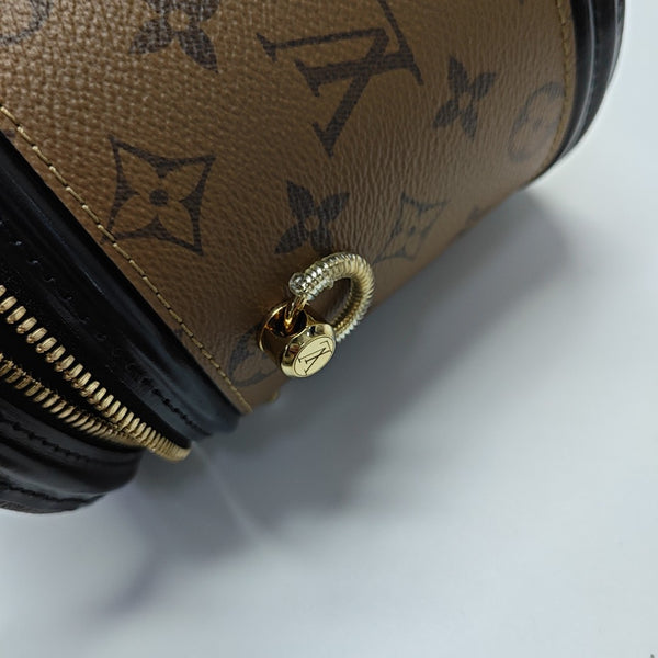 CANNES PM Monogram Coated Canvas Brown