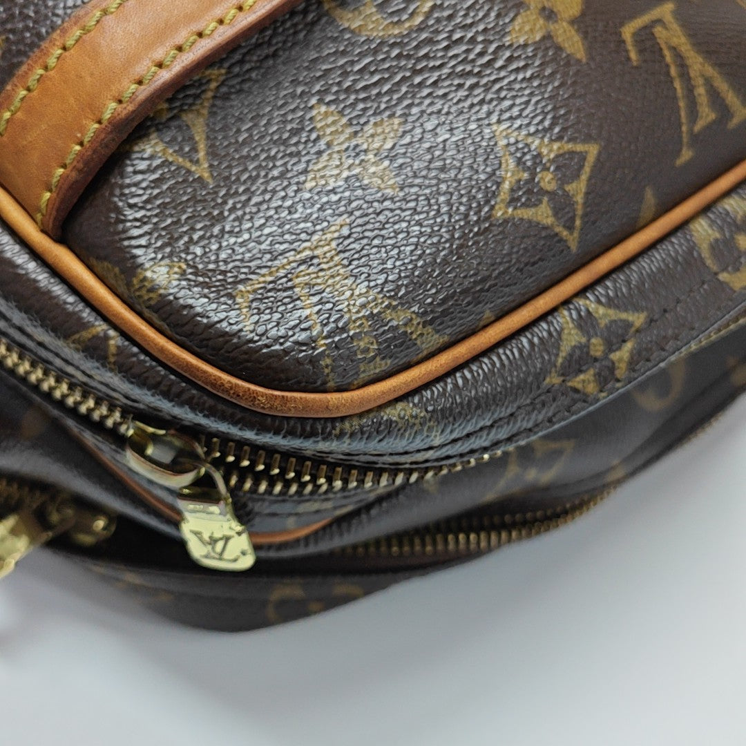 REPORTER Monogram Coated Canvas Brown