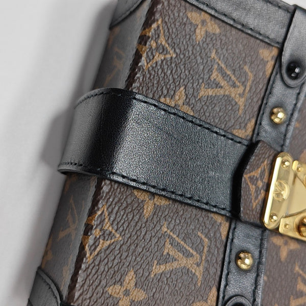 TRUNK Monogram Coated Canvas Brown