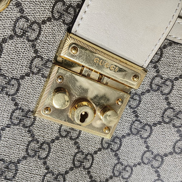 Padlock Small Monogram Coated Canvas Beige