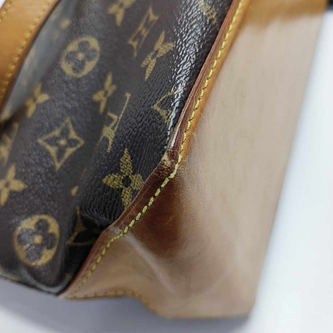 PIANO Monogram Coated Canvas Brown