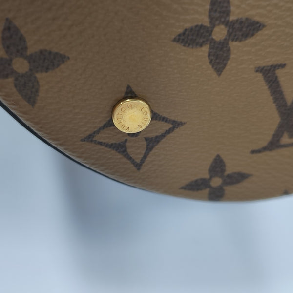 CANNES PM Monogram Coated Canvas Brown