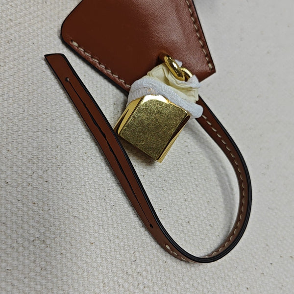 Authenticated pre-owned  CABAS CELINE Medium Canvas Beige - Top Handle Bag at Looply