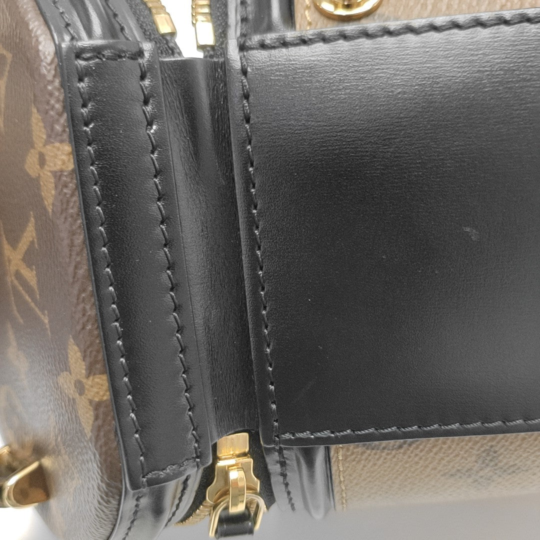 CANNES PM Monogram Coated Canvas Brown