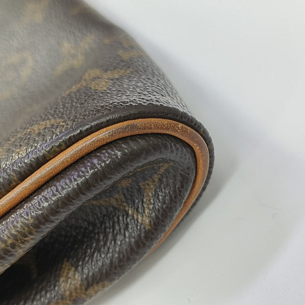 EVA Monogram Coated Canvas Brown